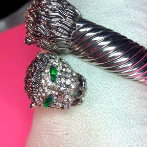 Jaguar bracelet, cuff, hinged, green eyes, open mouth, striking